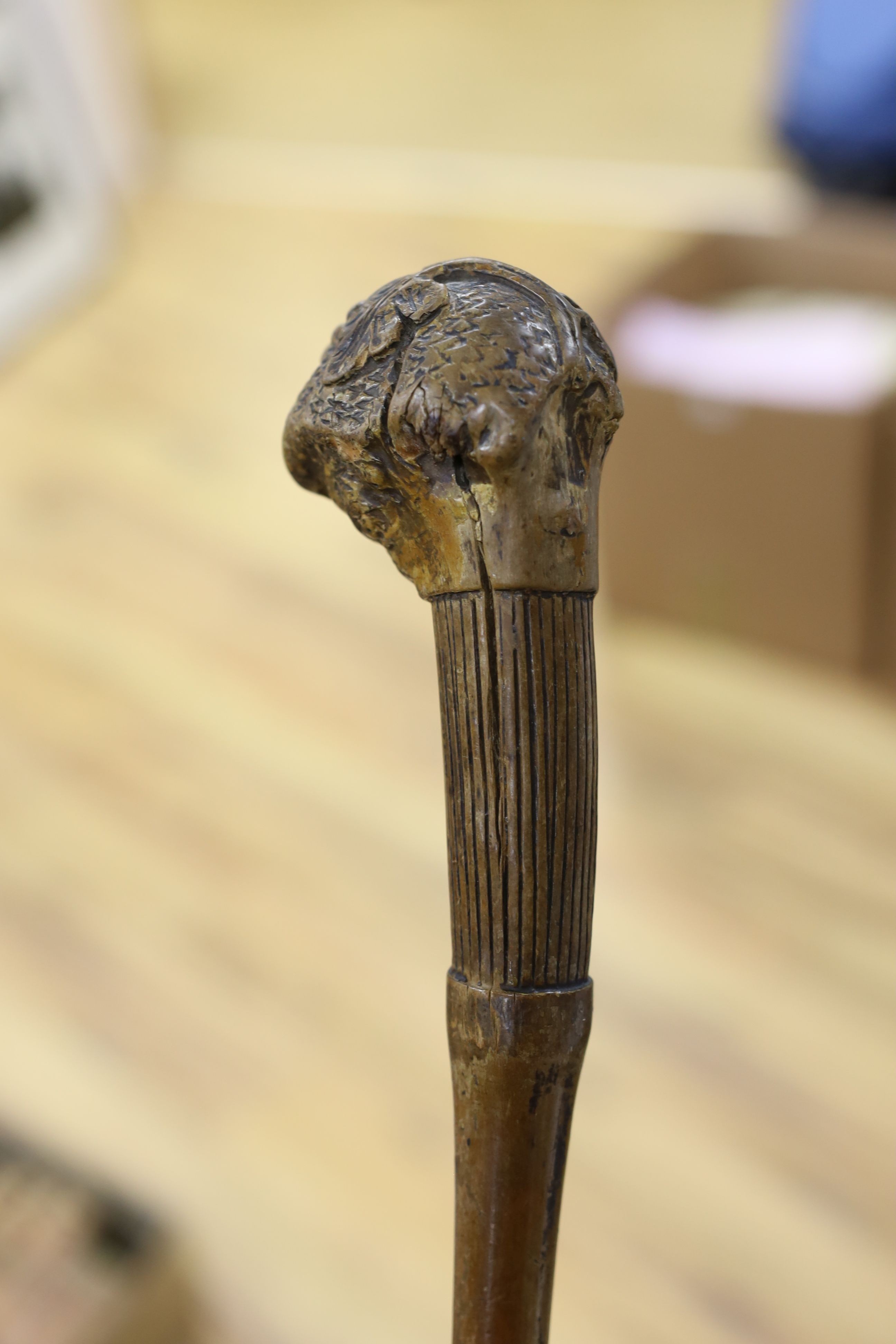 A 19th century folk art walking stick, 89 cms long.